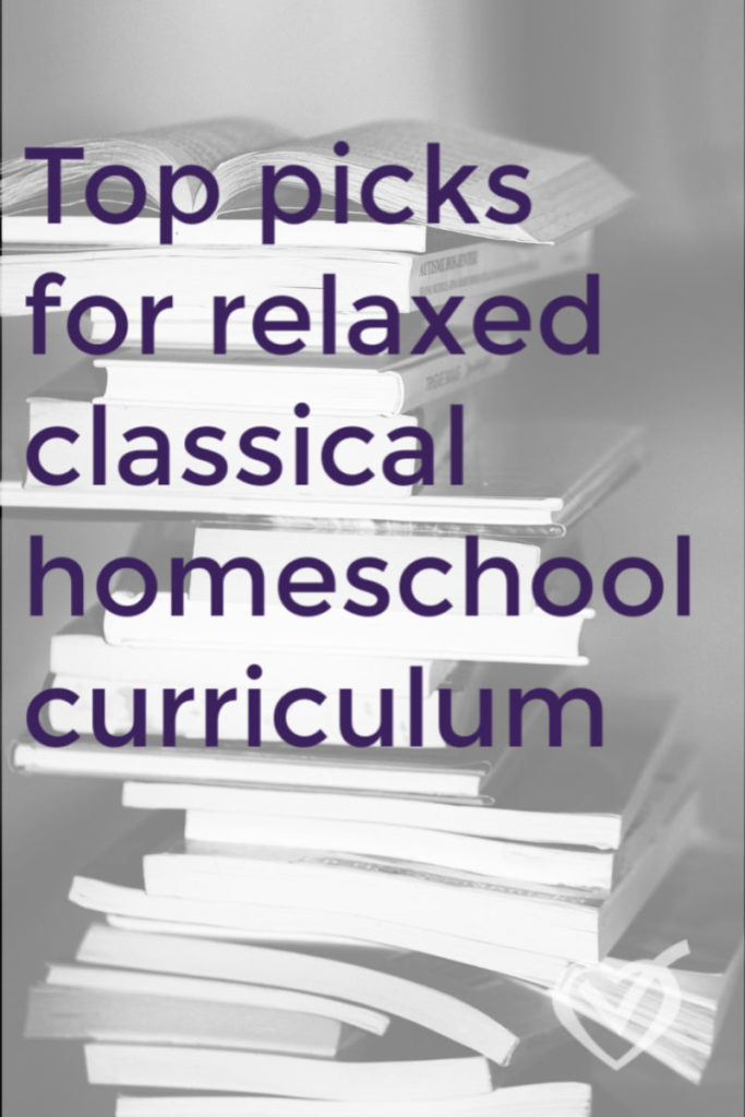 homeschool curriculum book pile